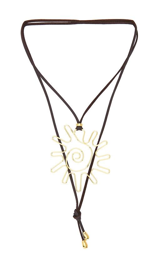eliou sun wrap necklace in brown.
