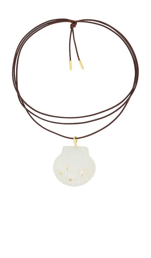 eliou vieira wrap necklace in metallic gold.