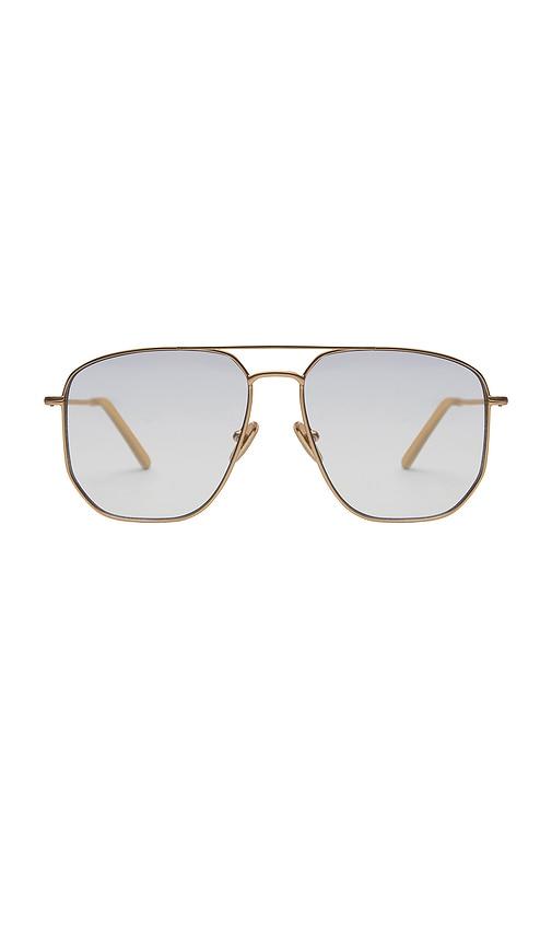 elisa johnson celine eyeglasses in metallic gold.