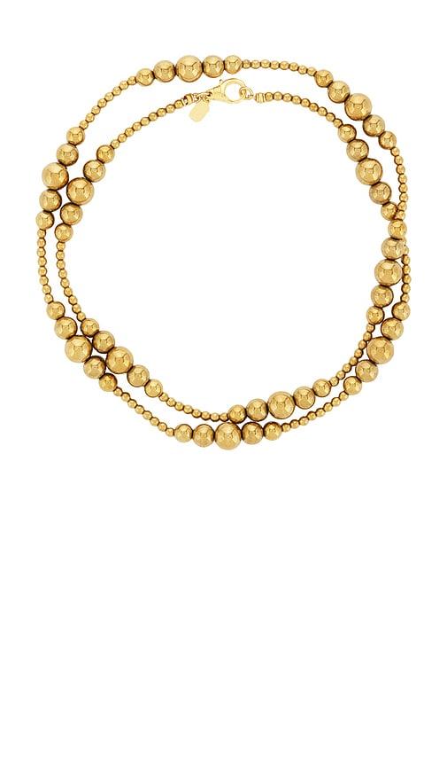elizabeth cole maissa necklace in metallic gold.