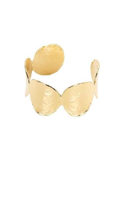 emma pills sunset hour arm cuff in metallic gold.