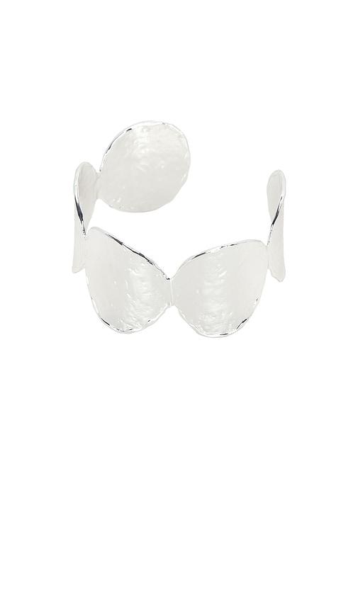 emma pills sunset hour arm cuff in metallic silver.