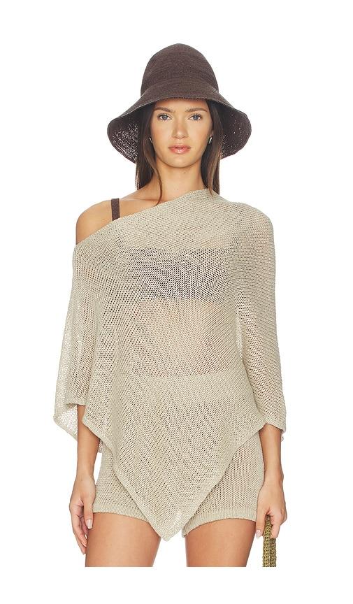 enza costa linen open knit poncho in beige.