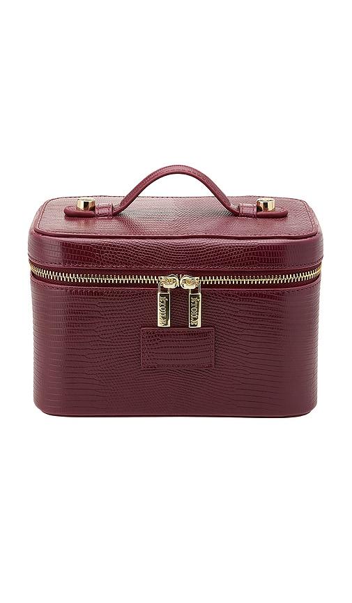 etoile collective mini vanity case in burgundy lizard print.
