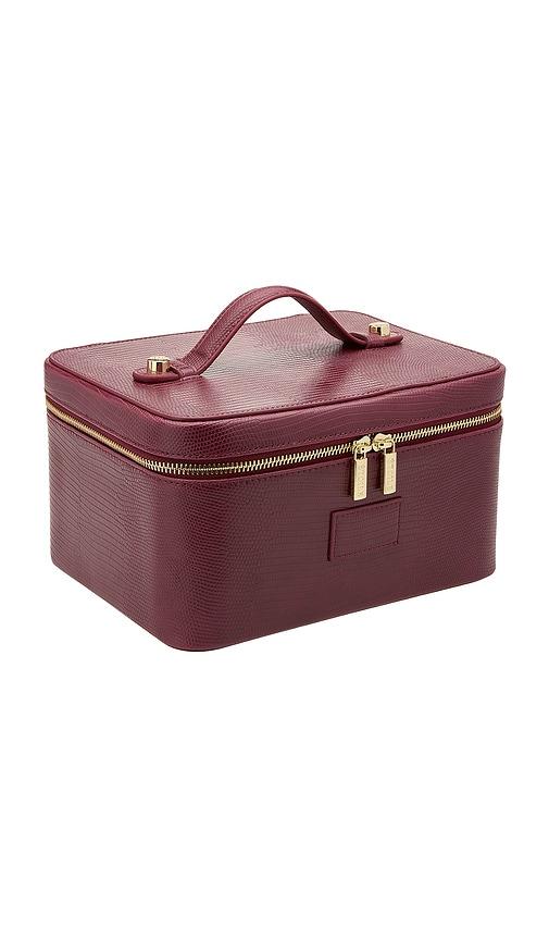 etoile collective vanity case in burgundy lizard print.