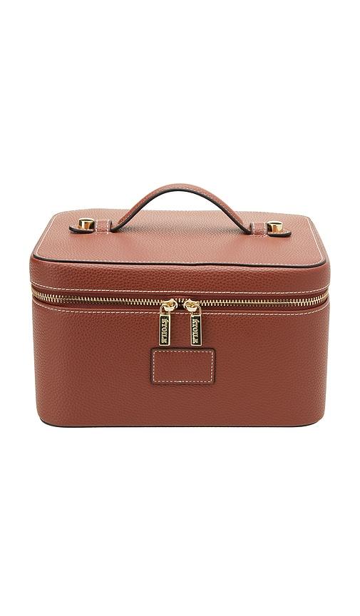 etoile collective vanity case in ginger brown.