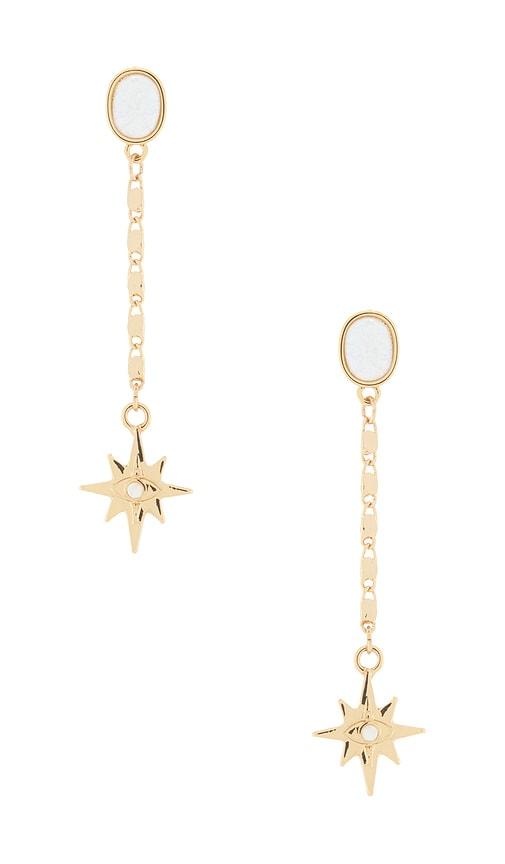 ettika  in metallic gold.