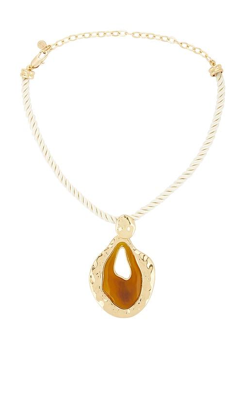 ettika acrylic pendant necklace in tan.