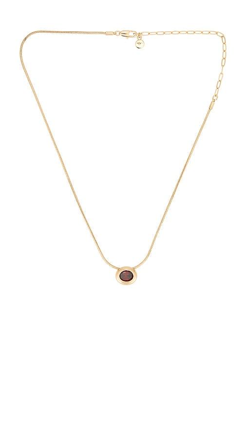 ettika bezel stone necklace in metallic gold.