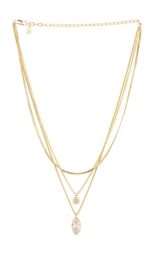 ettika classic multi stone pendant in metallic gold.