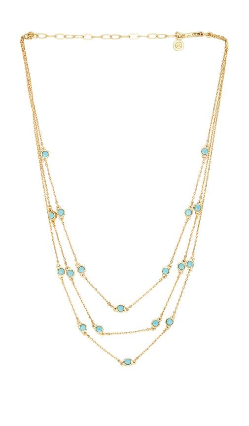 ettika crystal dot layered necklace in metallic gold.