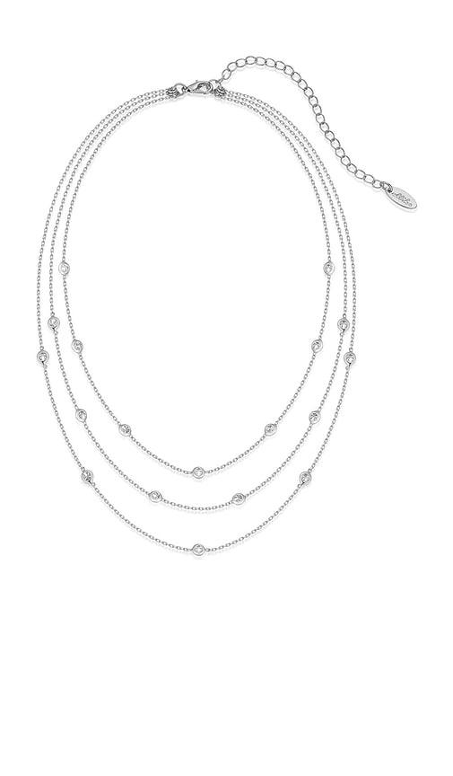 ettika crystal dot layered necklace in metallic silver.
