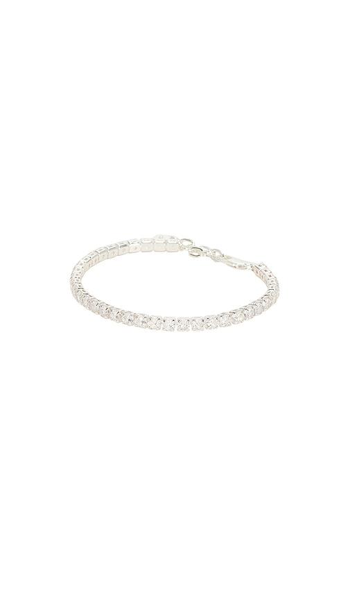 ettika crystal tennis bracelet in metallic silver.