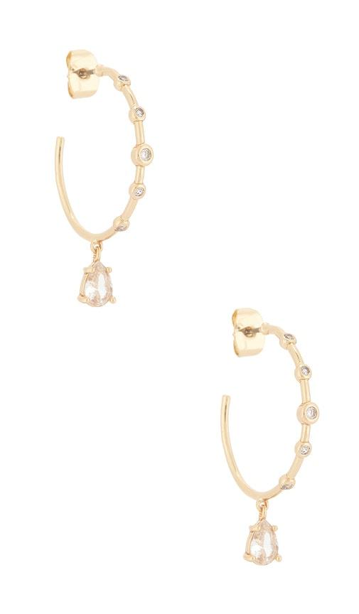 ettika delicate crystal charm hoop earrings in metallic gold.