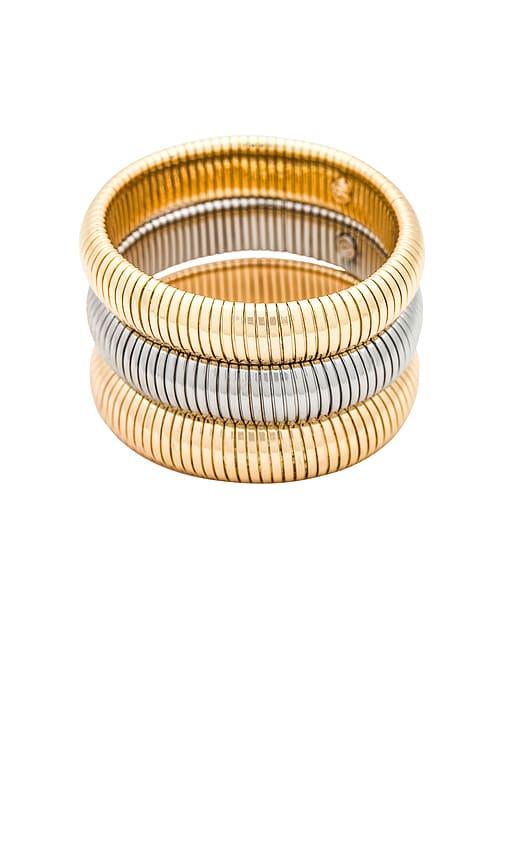 ettika flex snake chain stretch bracelet set in metallic gold.