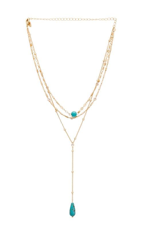 ettika forever multi chain lariat choker in metallic gold.