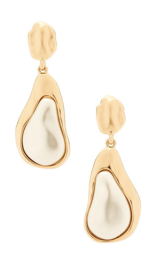 ettika hidden gem dangle earrings in metallic gold.