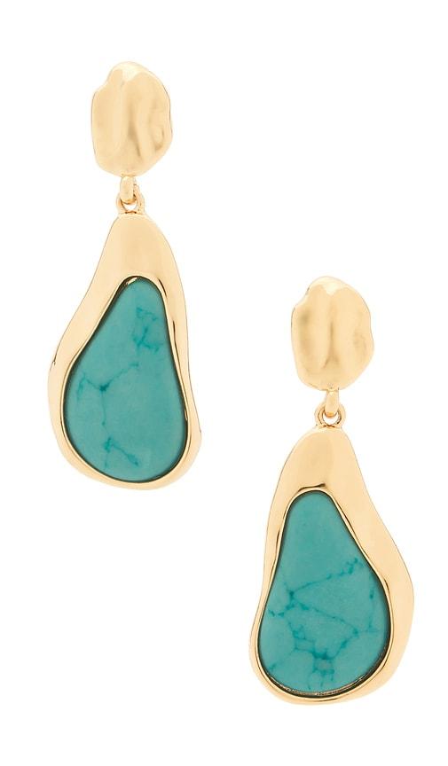 ettika hidden gem dangle earrings in metallic gold.