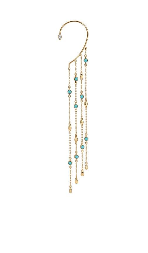 ettika linear chains statement ear cuff in metallic gold.