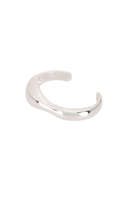 ettika liquid cuff in metallic silver.