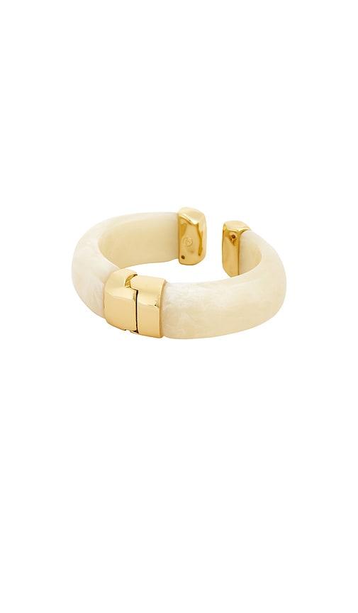 ettika liquid resin cuff bracelet in beige.