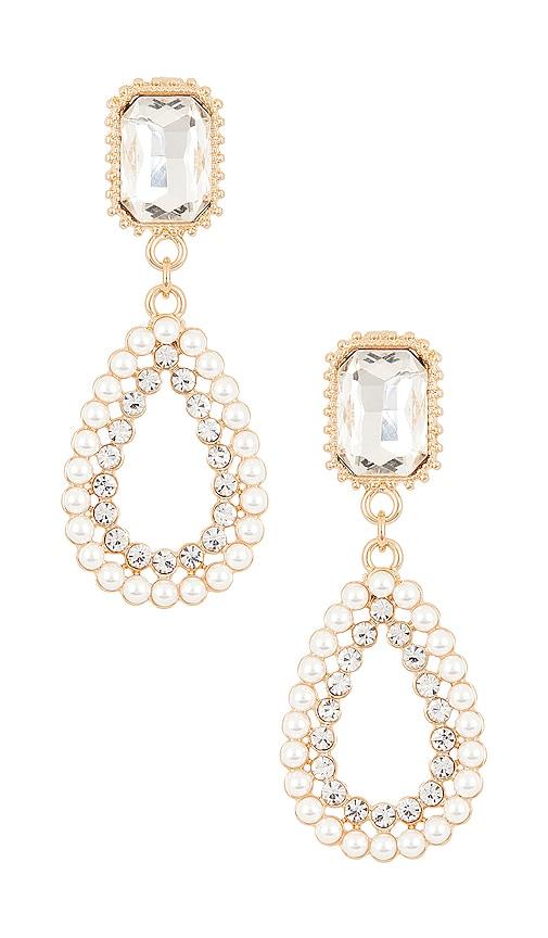 ettika luxe earrings in ivory.