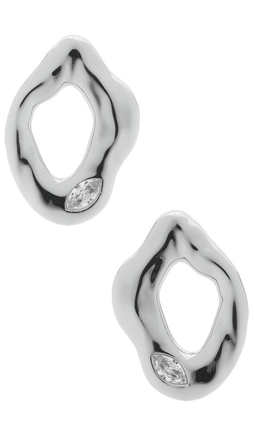 ettika melting metal crystal earrings in metallic silver.