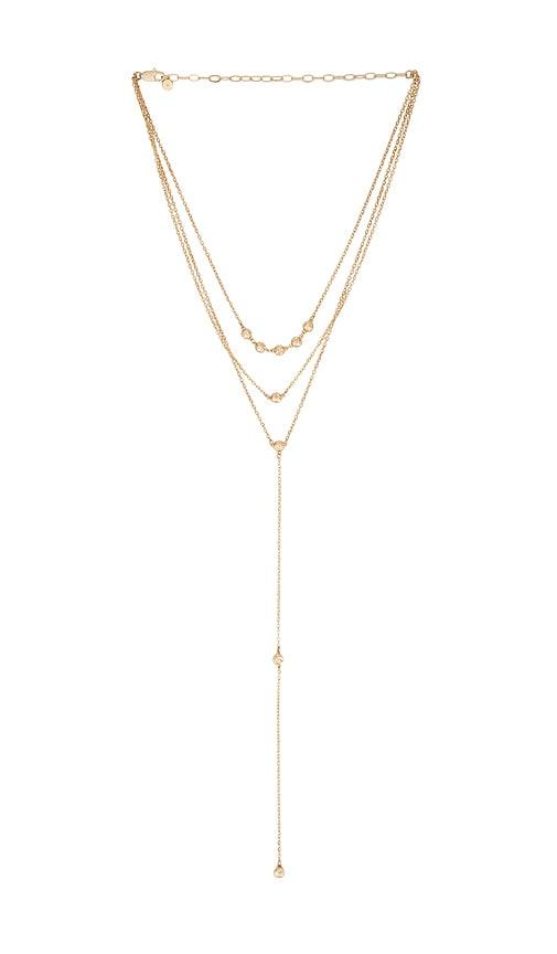ettika molten layered lariat necklace in metallic gold.