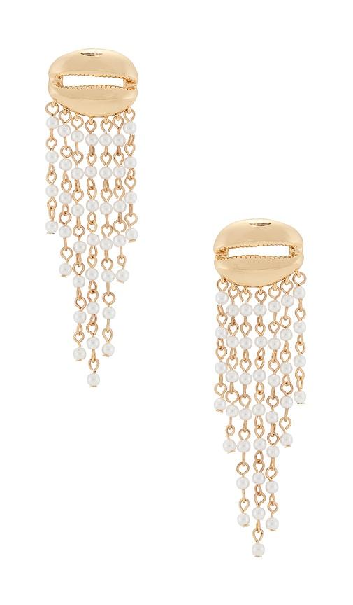 ettika mykonos shell dangle earrings in metallic gold.