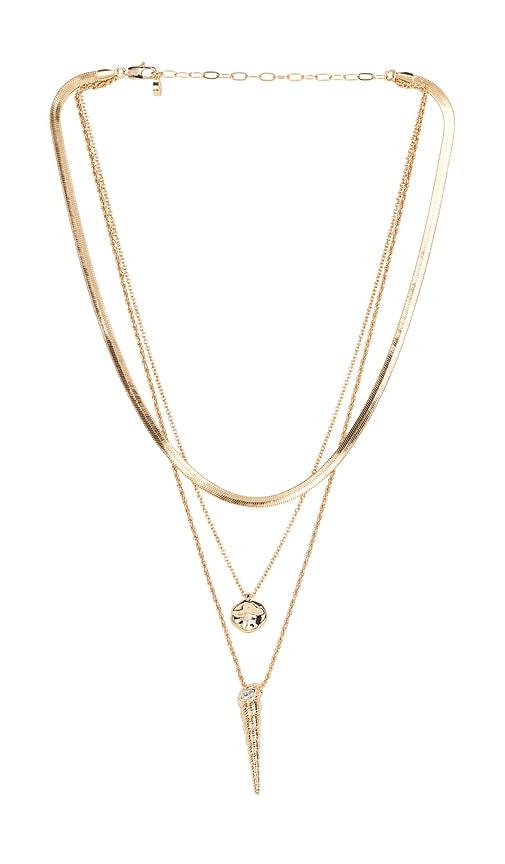 ettika oceanic dreams layered necklace in metallic gold.
