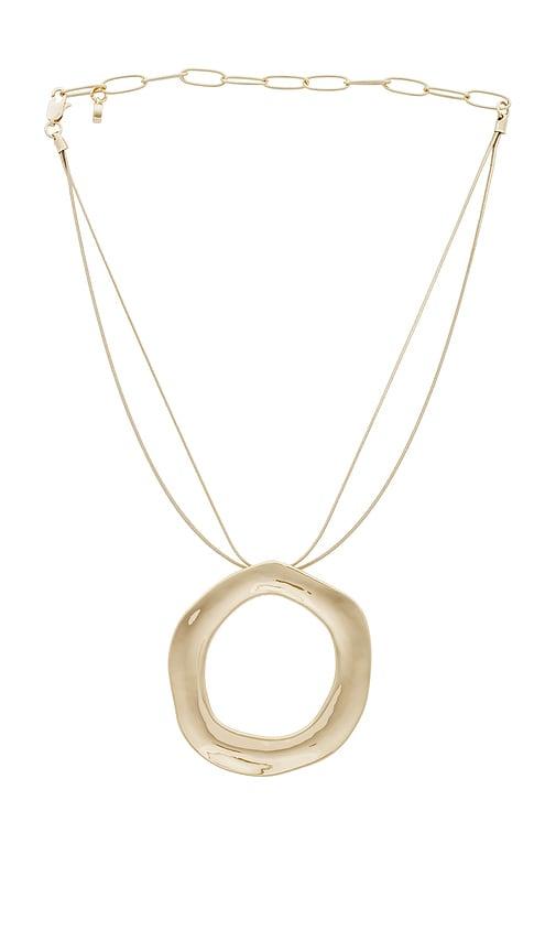 ettika open circle statement necklace in metallic gold.