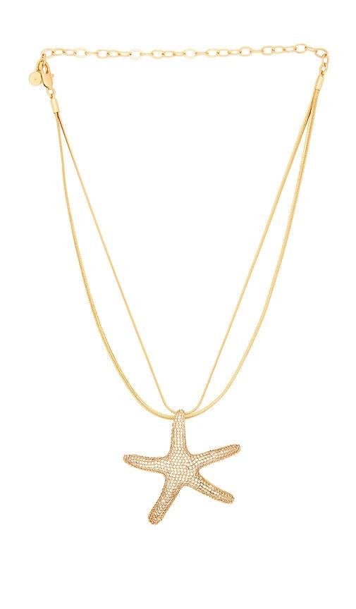 ettika pav? starfish necklace in metallic gold.