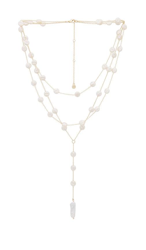 ettika pearl coin layered lariat necklace in ivory.