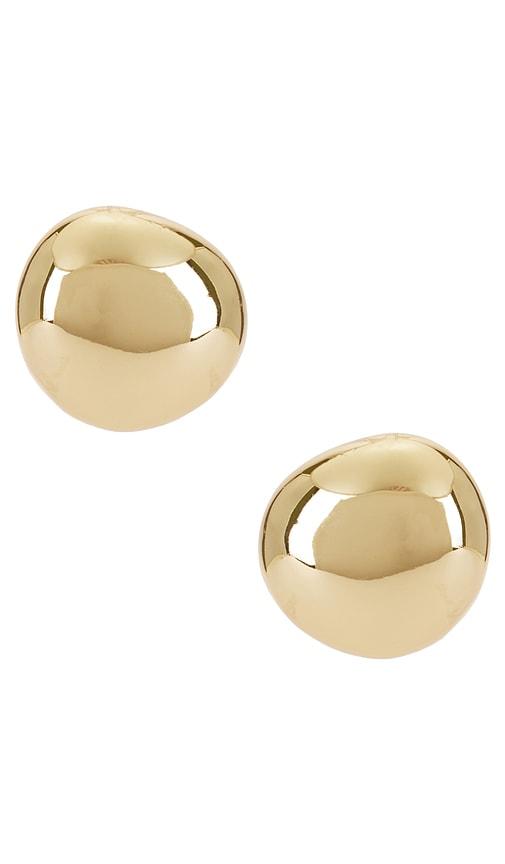 ettika polished pebble stud earrings in metallic gold.