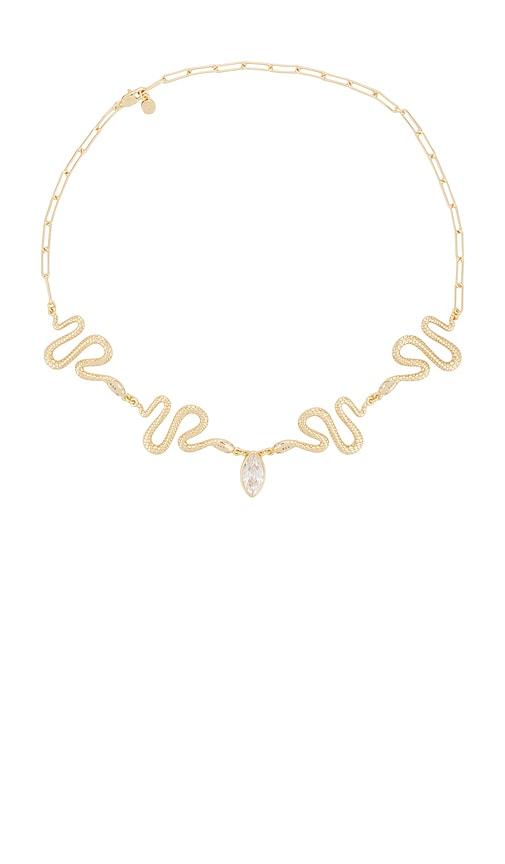 ettika royal snake choker in metallic gold.