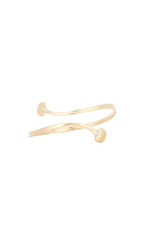 ettika santorini shell arm cuff in metallic gold.
