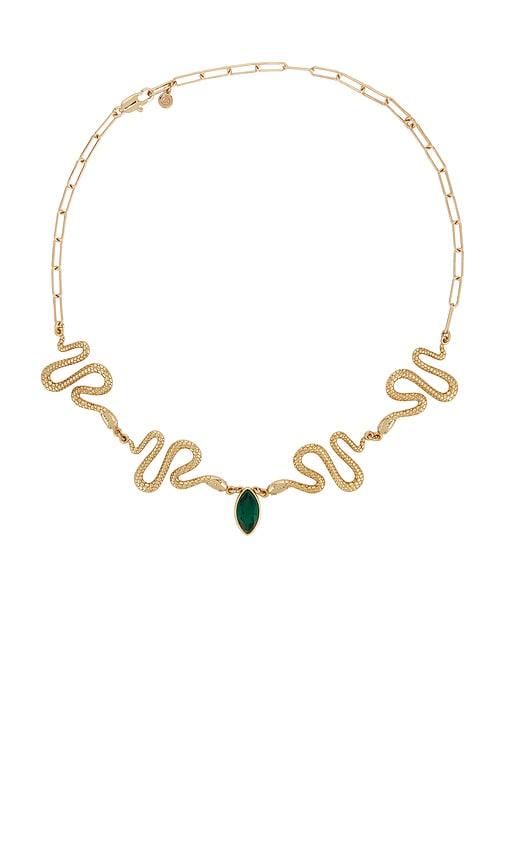 ettika serpentina lariat in metallic gold.