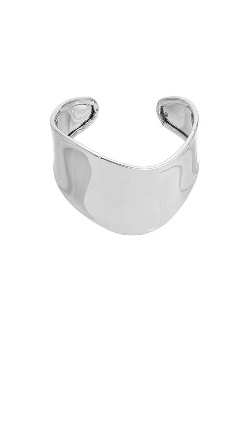 ettika smooth cuff bracelet in metallic silver.