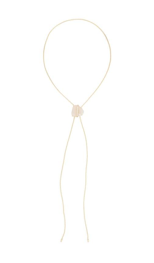 ettika solstice bolo necklace in metallic gold.