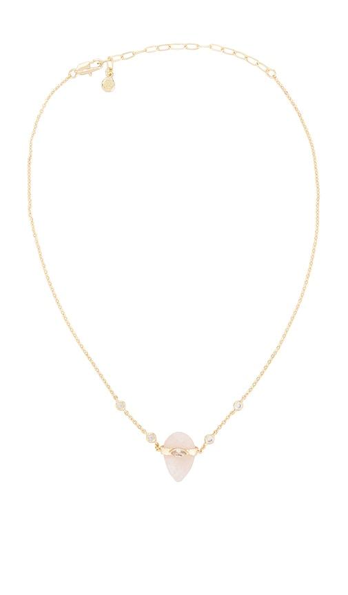 ettika solstice necklace in metallic gold.