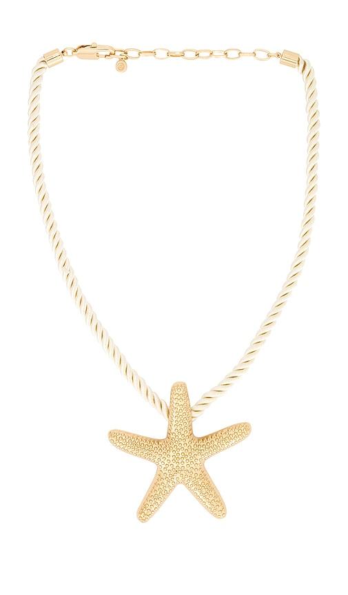 ettika starfish statement pendant necklace in metallic gold.
