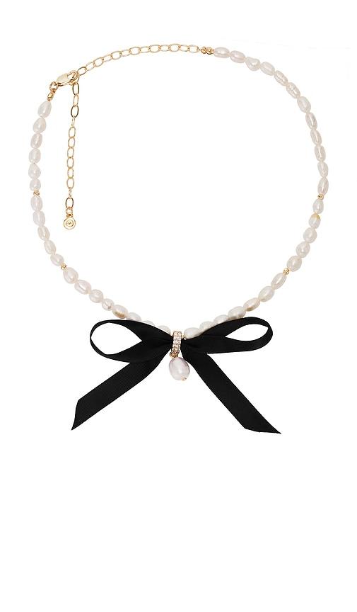 ettika velvet bow statement pearl choker in cream.
