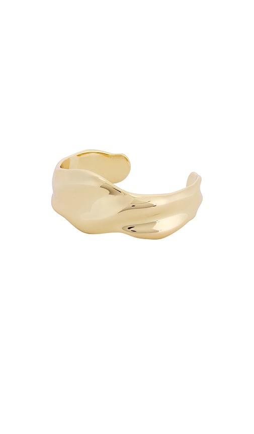 ettika wavy days cuff in metallic gold.