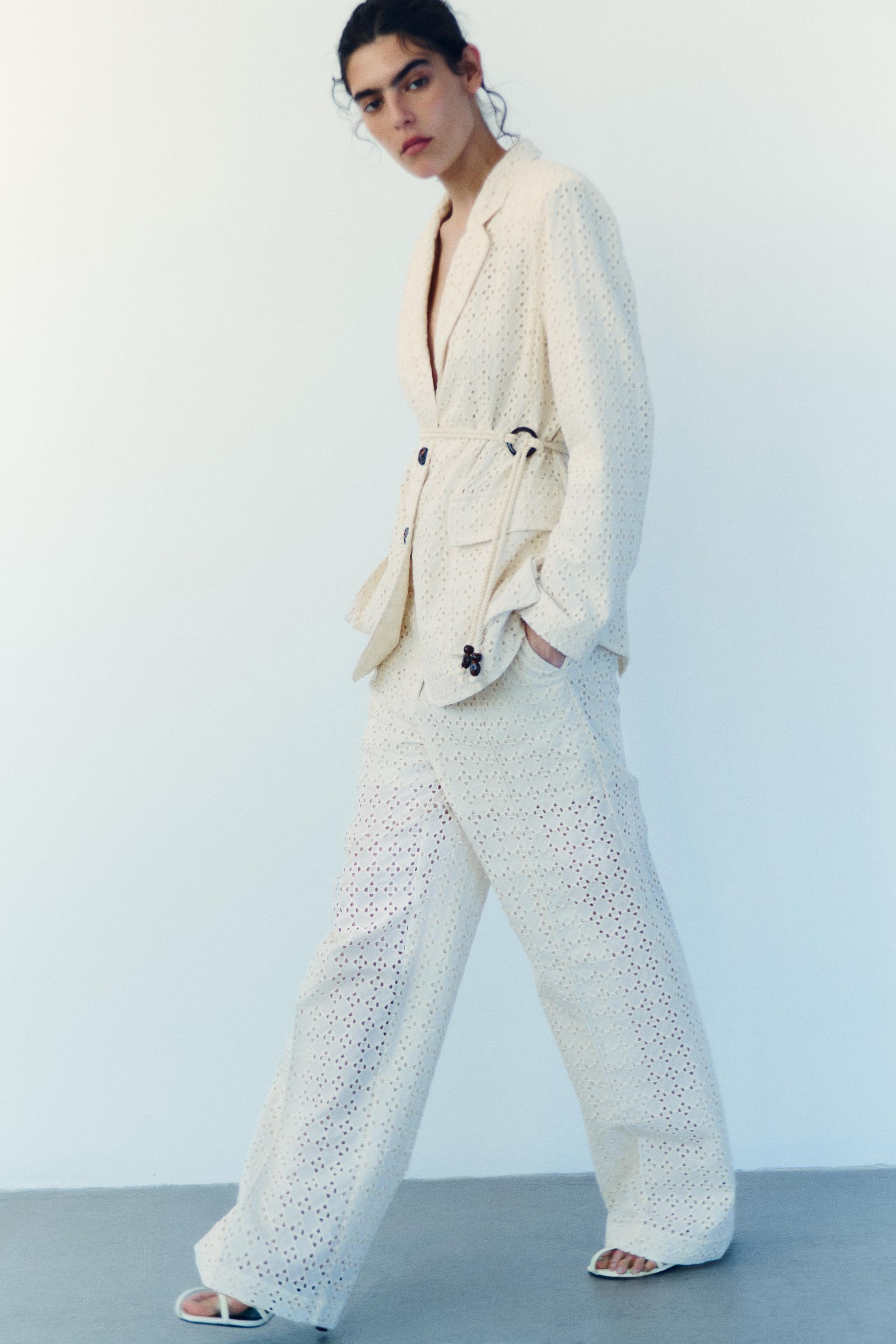eyelet-embroidered dress pants