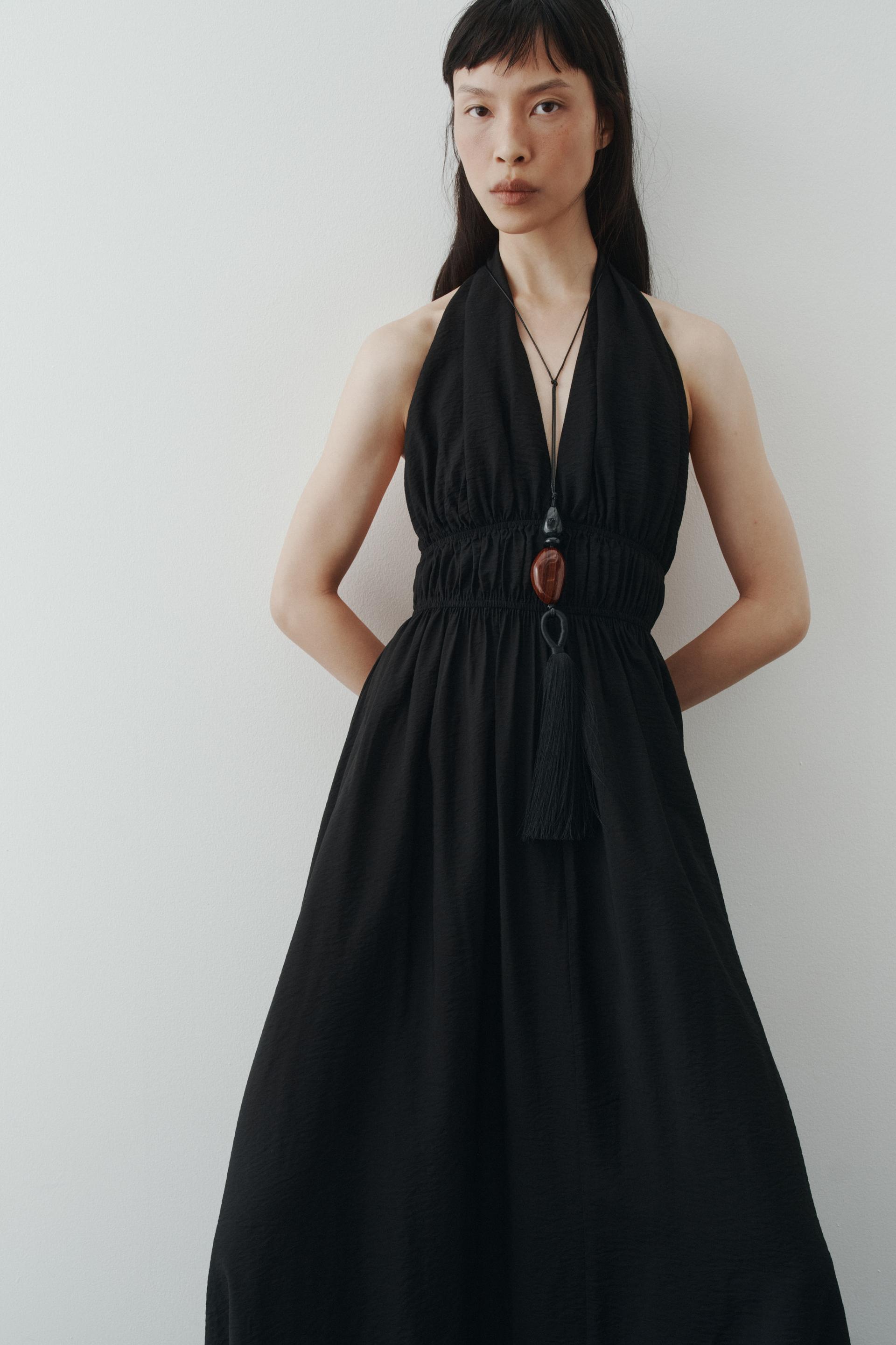 flared halterneck dress