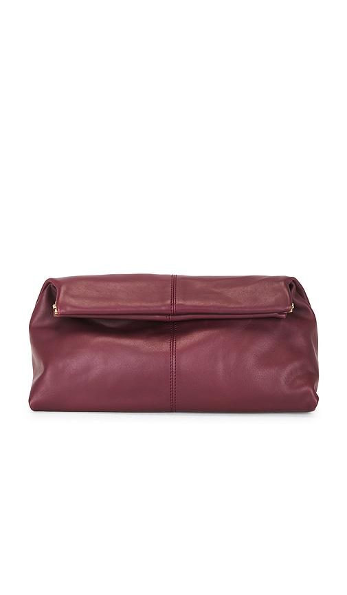 flattered clay clutch in burgundy.