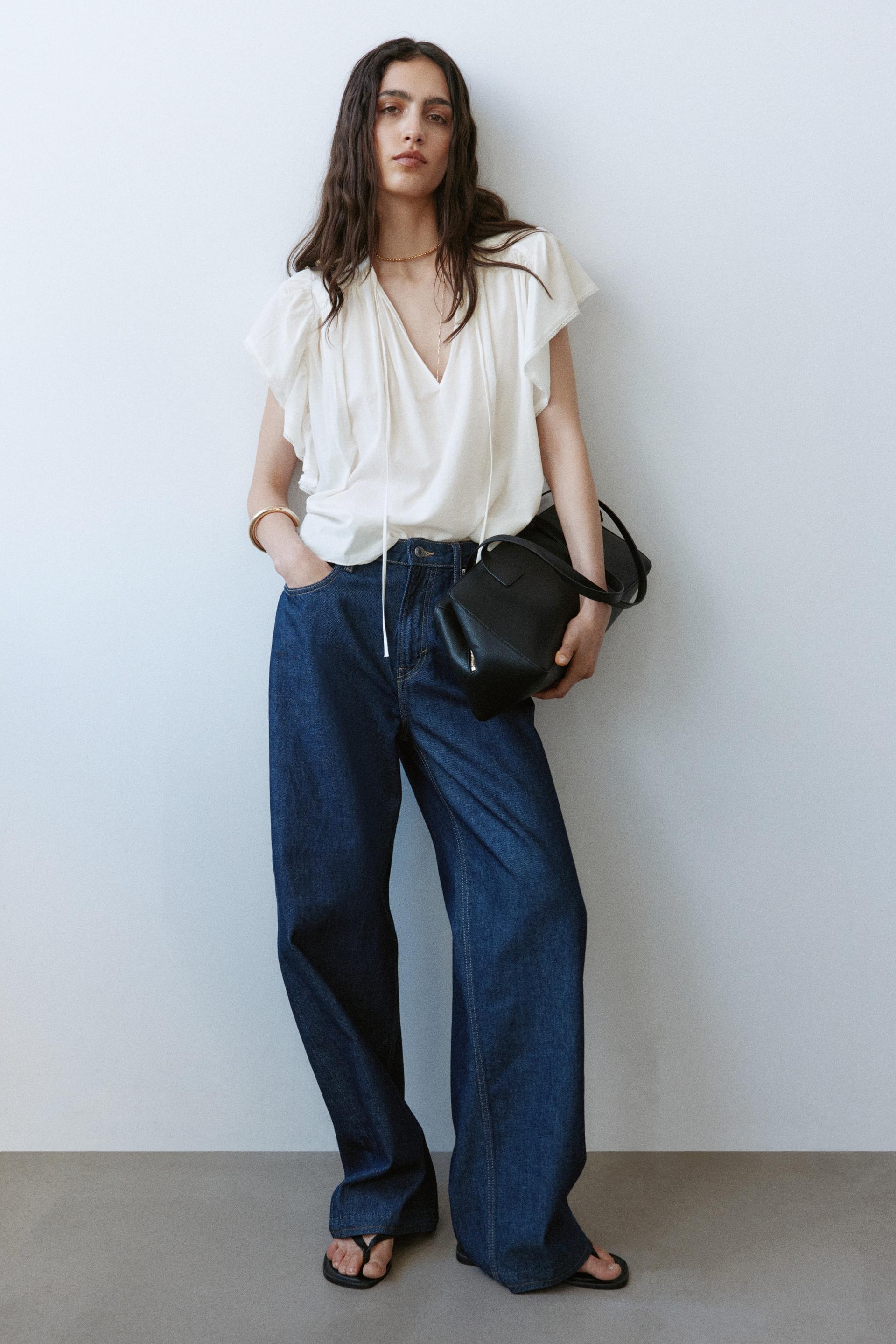 flutter-sleeved lace-trimmed blouse