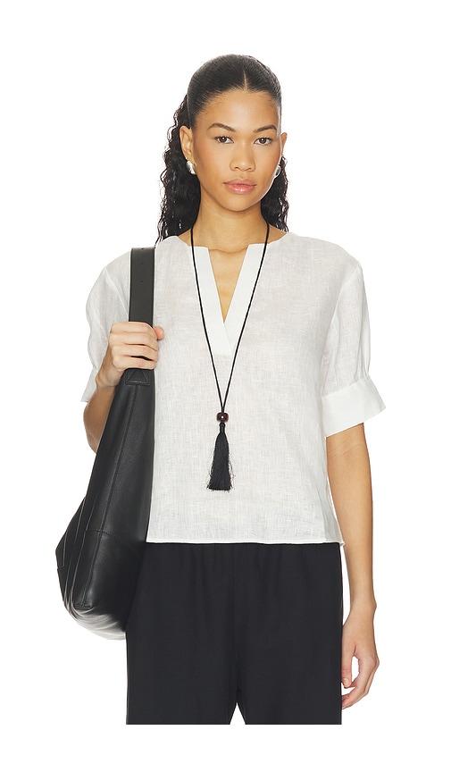 frame the v-neck popover top in white. - size l (also in m, s, xs)
