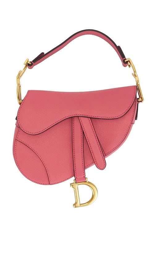 fwrd renew dior mini saddle bag in pink.