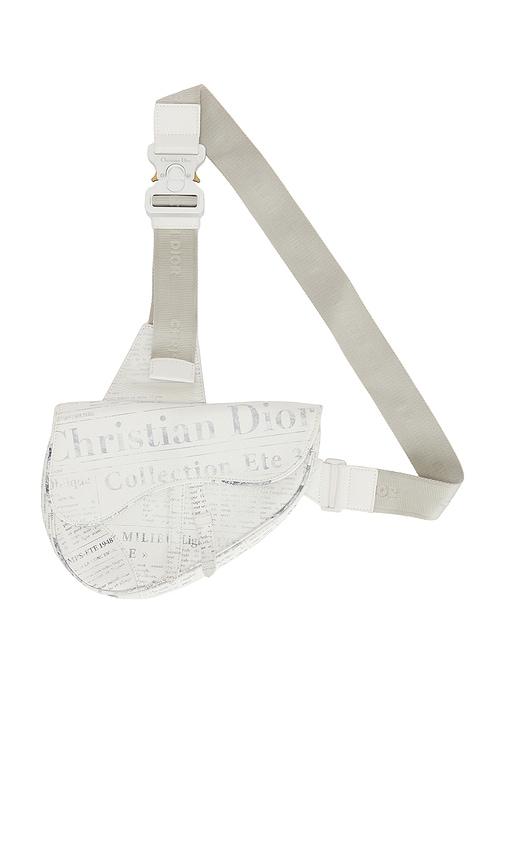 fwrd renew dior newspaper saddle bag in white.